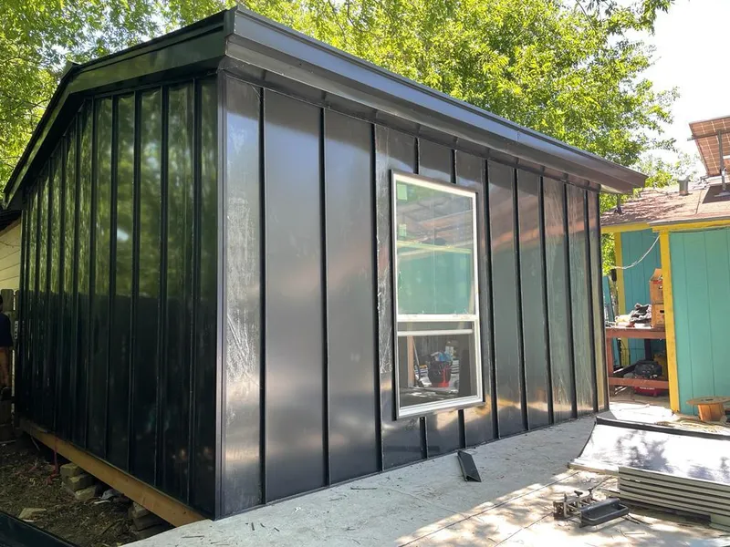 Black standing seam metal wall panels for Roof Inspection in Innsbrook